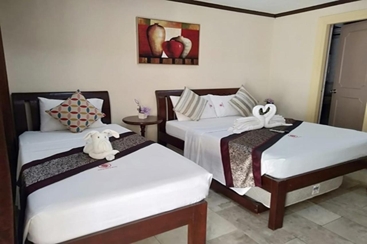 Suzuki Beach Hotel 오롱가포 외부 사진